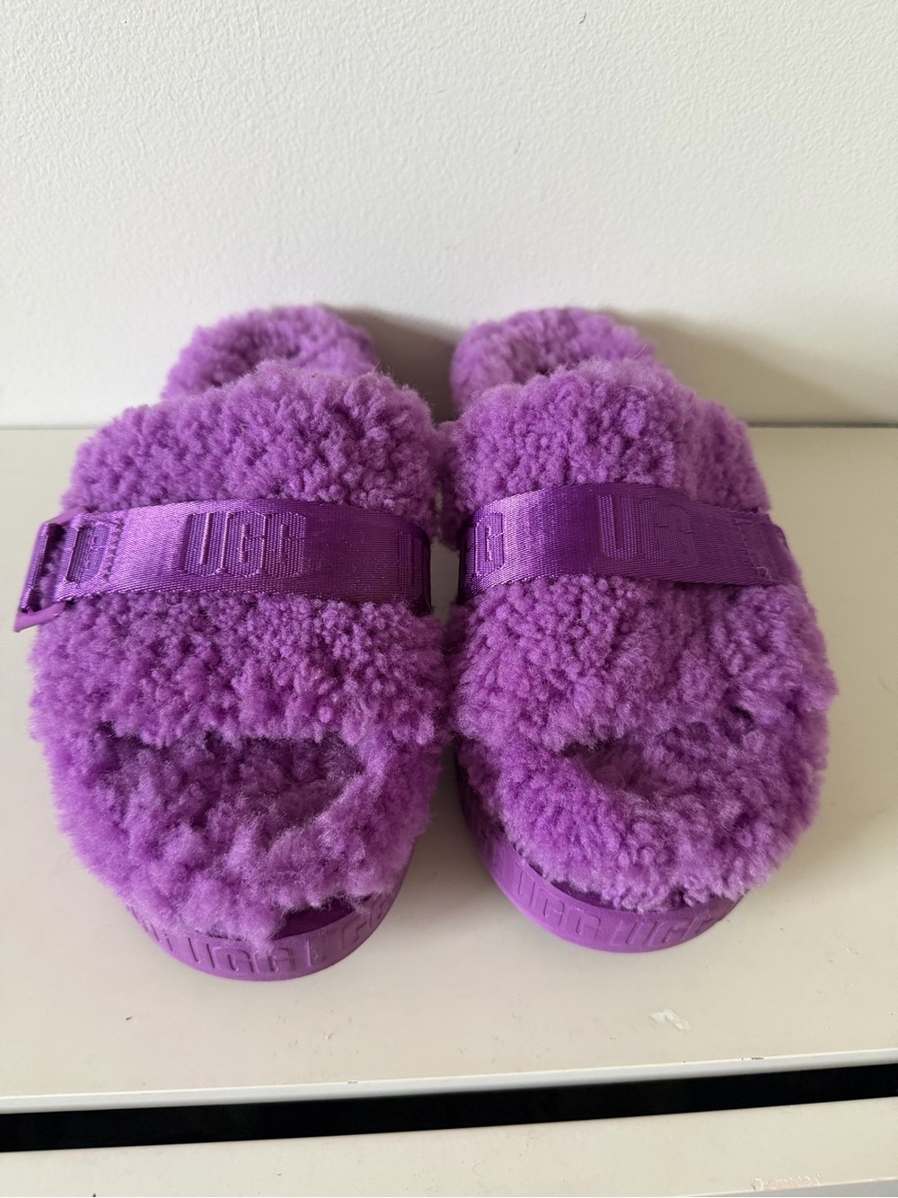 UGG Women’s Purple Fluff Slide Sandals. 9.5